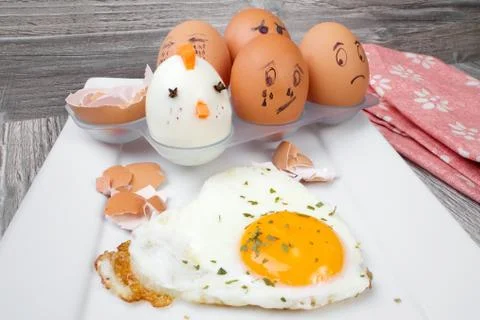 Funny egg faces with daring of sad emotions afraid of cooking Stock Photos