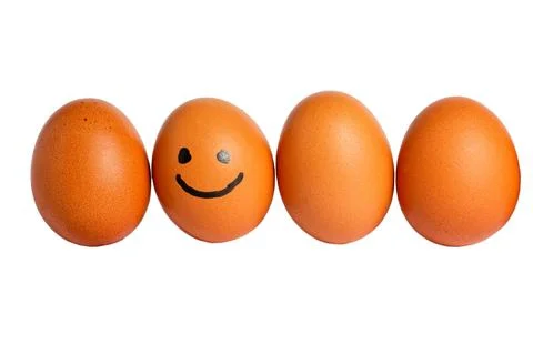 Funny eggs row with smiling face Fotos Stock