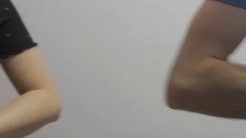 Funny elbow shake - creative handshake with arms - no hands Stock Footage 127282956