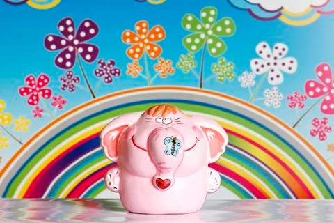 Funny elephant on a rainbow background Stock Photos