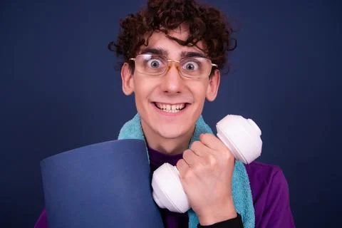 Funny emotions of an attractive guy. Blue background. Foto stock