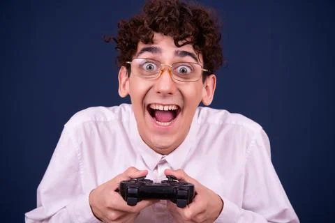 Funny emotions of an attractive guy. Blue background. Foto stock