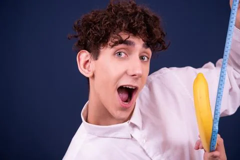 Funny emotions of an attractive guy. Blue background. Foto stock