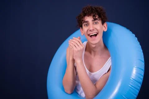 Funny emotions of an attractive guy. Blue background. Foto stock