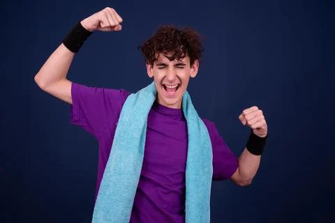 Funny emotions of an attractive guy. Blue background. Foto stock