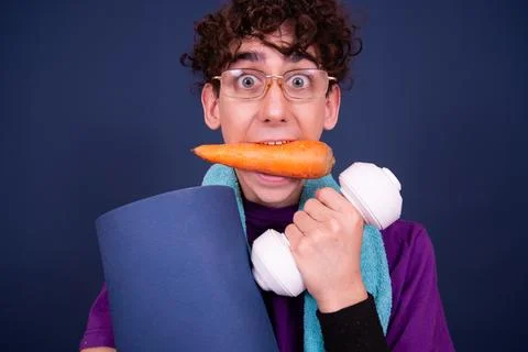 Funny emotions of an attractive guy. Blue background. Foto stock