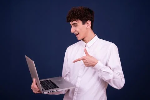 Funny emotions of an attractive guy. Blue background. Foto stock