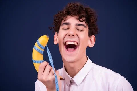 Funny emotions of an attractive guy. Blue background. Foto stock
