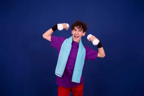 Funny emotions of an attractive guy. Blue background. Foto stock