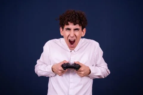 Funny emotions of an attractive guy. Blue background. Foto stock