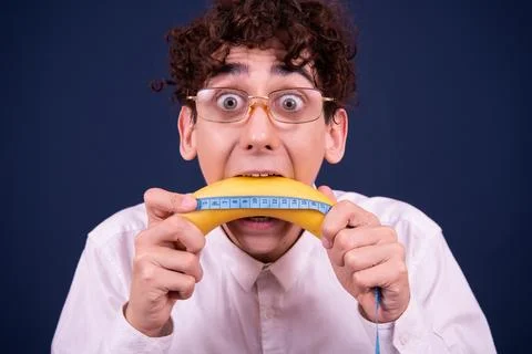 Funny emotions of an attractive guy. Blue background. 스톡 사진