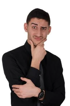 Funny Expression of a Young Man Thinking Stock Photos
