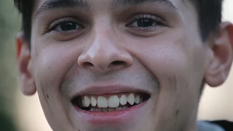 Funny face closeup , young boy outdoors in the evening Video stock 96217086