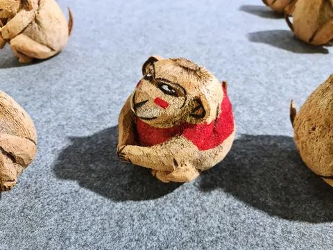 Funny Face Coconut Monkey Doll Looking at Camera Stock Photos