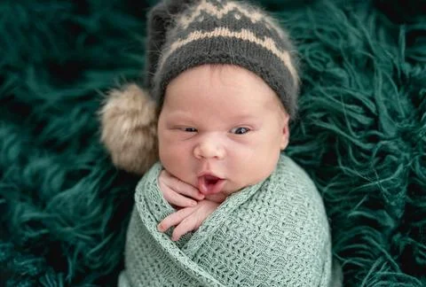 Funny face of newborn Stock Photos