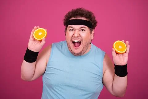 Funny fat man eats donuts. Retro style. Food and fitness. Stock Photos