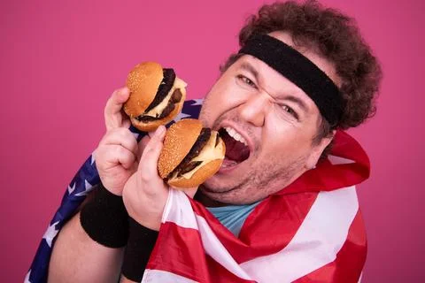 Funny fat man eats donuts. Retro style. Food and fitness. Foto stock