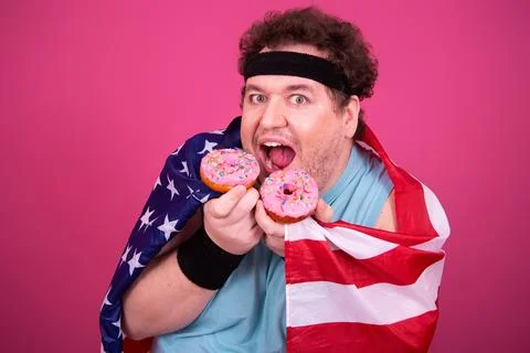 Funny fat man eats donuts. Retro style. Food and fitness. Stock Photos