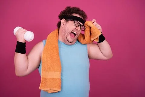 Funny fat man eats donuts. Retro style. Food and fitness. Stock Photos