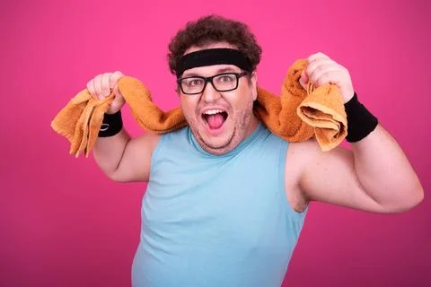Funny fat man eats donuts. Retro style. Food and fitness. Stock Photos