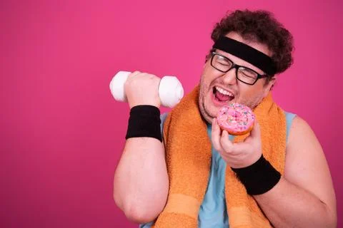 Funny fat man eats donuts. Retro style. Food and fitness. Stock Photos