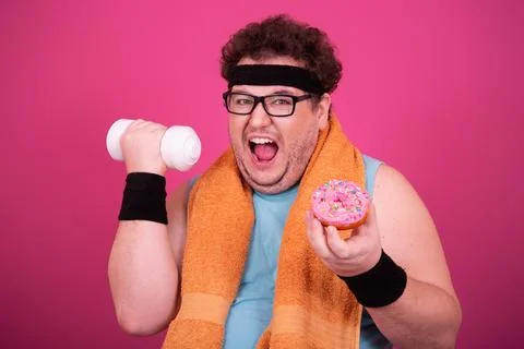 Funny fat man eats donuts. Retro style. Food and fitness. Stock Photos