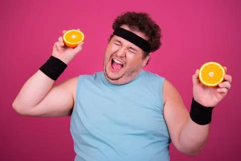 Funny fat man eats donuts. Retro style. Food and fitness. Stock Photos