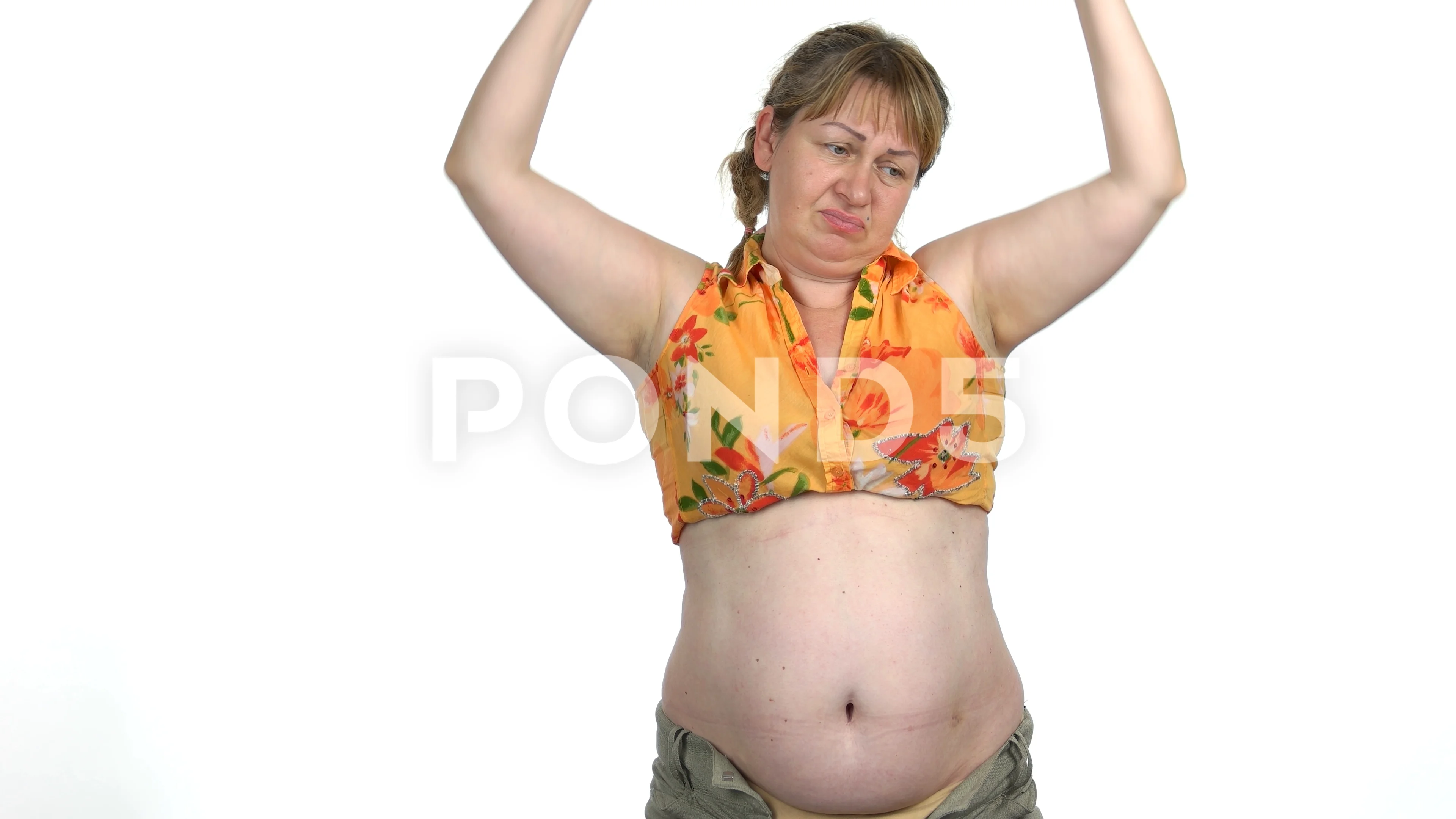 Funny fat woman lifting two small dumbbe... | Stock Video | Pond5