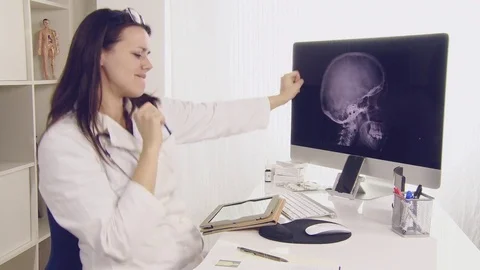 Funny female doctor dancing happy in office Stock Footage