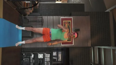 Funny freaky guy working out at home Stock Footage 152879017