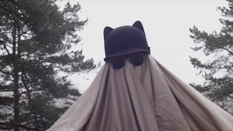 Funny ghost in sheets and glasses 库存影片 164301698