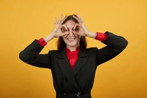 Funny Girl Holds Fingers Near Her Eyes, Imitates Glasses. People Fool, Happy Stock Photos