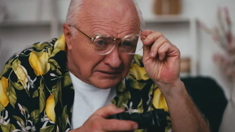 Funny grandpa in glasses learning to Stock Video Pond5