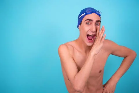Funny guy with an inflatable ring in the pool. Stock Photos