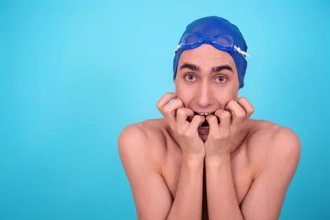 Funny guy with an inflatable ring in the pool. Stock-Fotos