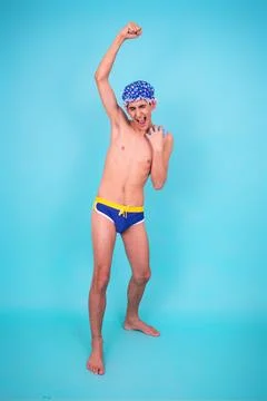 Funny guy with an inflatable ring in the pool. Stock-Fotos