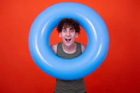 Funny guy with an inflatable ring. Vacation and holidays. Stock Photos