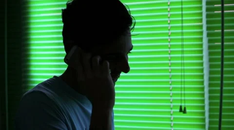 Funny guy talking at smartphone Stock Footage 57661281