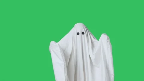 Funny halloween ghost in white sheet isolated on chroma key green screen 스톡 동영상 285747043