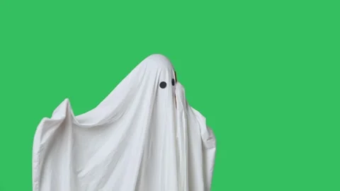 Funny halloween ghost in white sheet talking on smartphone angry expression 스톡 동영상 285748378