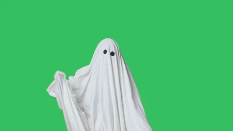 Funny halloween ghost in white sheet confused thinking, raises hand with idea Stock Footage 285749315