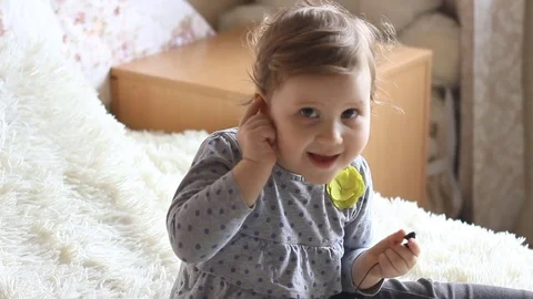 Funny happy child with tablet in hands dresses headphones Stock Footage 73917650