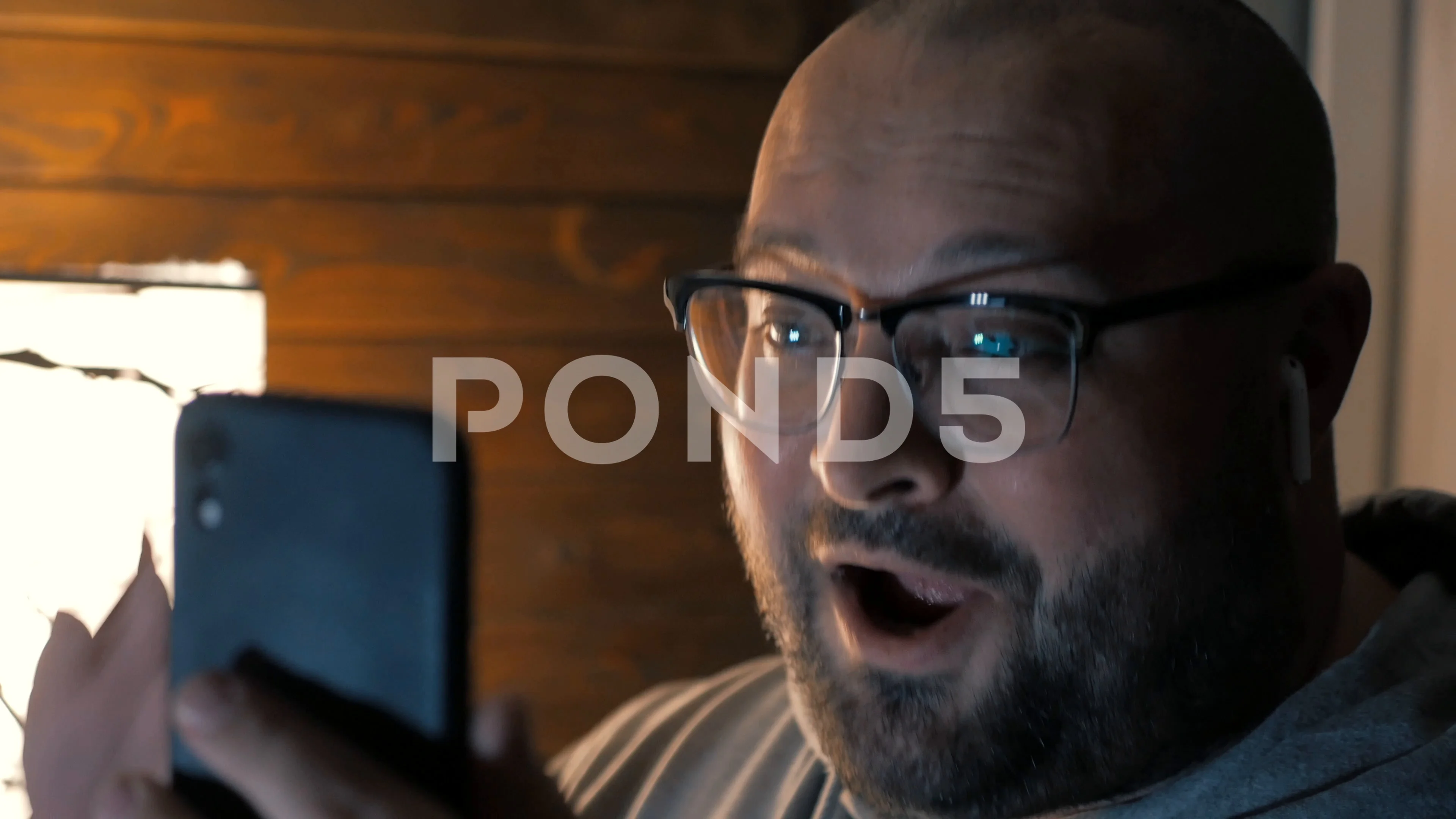 Funny happy fat man in glasses chatting ... | Stock Video | Pond5