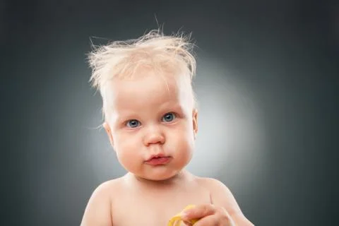 Funny kid making faces Stock Photos
