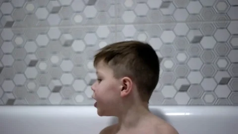 Funny Little Boy Lying on Sofa Stock Footage 71793447