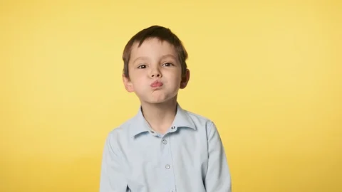 Funny little boy playfully making faces looking at camera. Positive emotion. Stock Footage 119172689