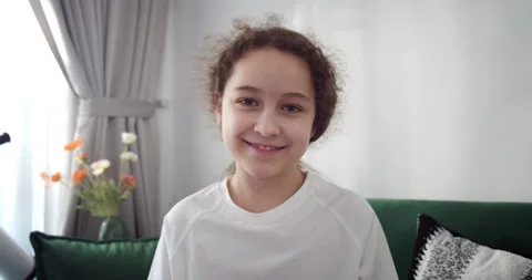 Funny little boy smiling while looking at camera at home, cute child looking at Stock Footage 263187990