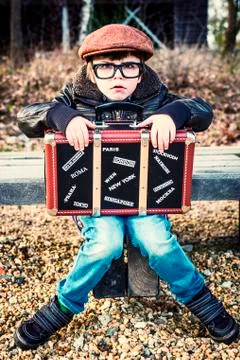 Funny looking boy with strange expression Stock Photos