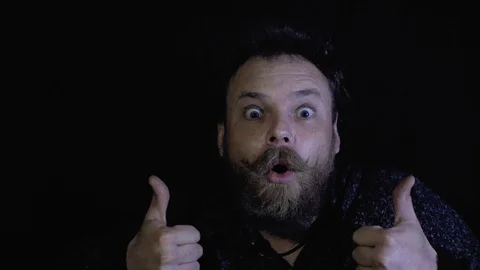 Funny man with beard and mustache showing thumbs up . weird guy doing like Stock Footage 105464839
