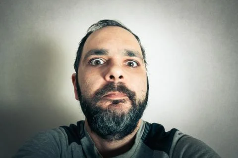 Funny man with the beard making expressions Stock-Fotos